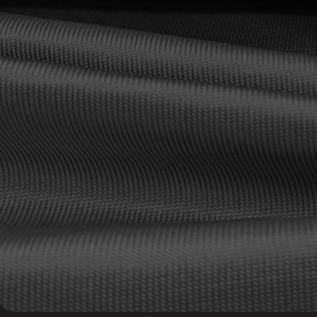 Tela elástica resistente al corte, traje de esquí, tela resistente al desgaste, tela resistente a los rasguños de patinaje de velocidad corta, pantalones de motocicletas, tela resistente a la lágrima y resistente a la lágrima
