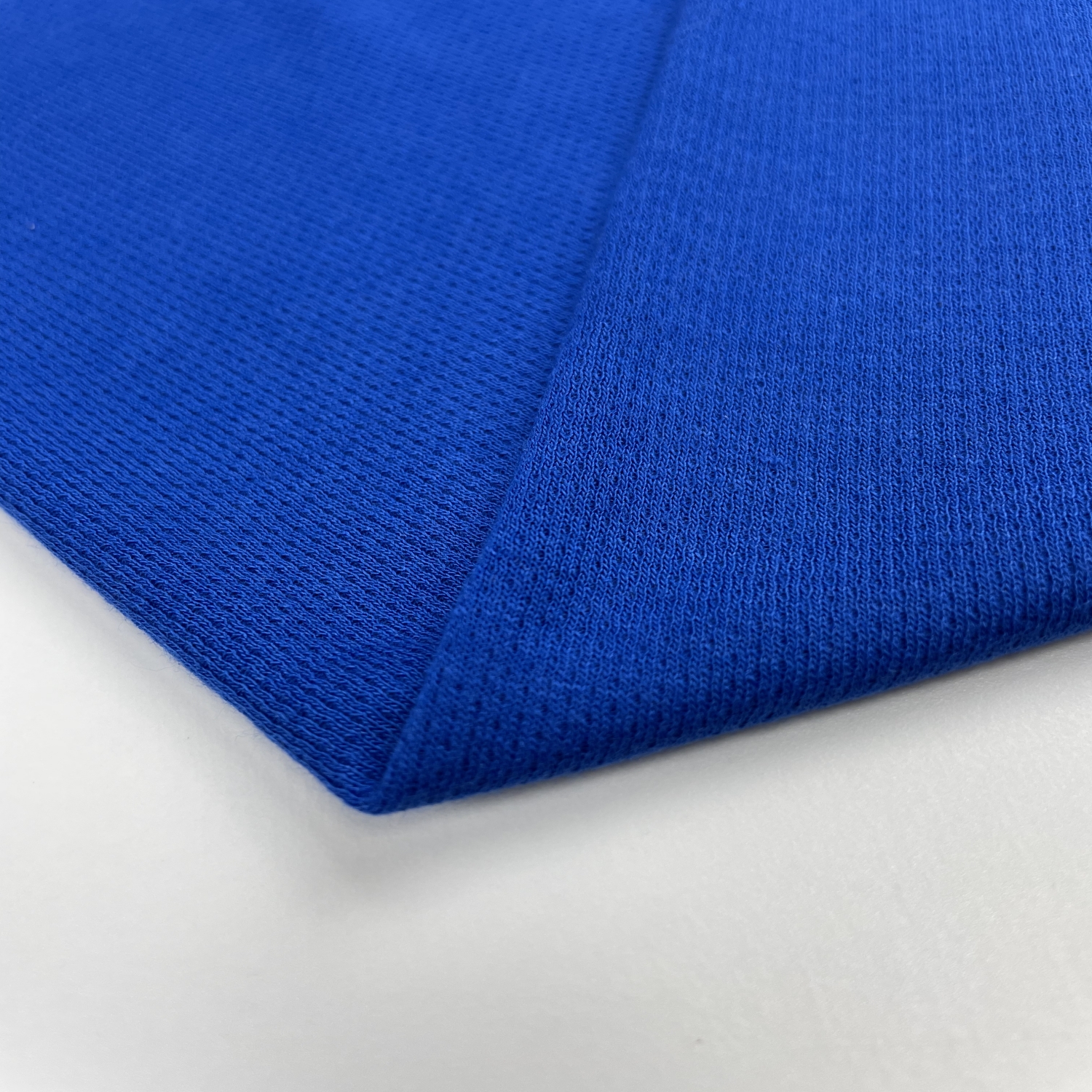 Tela hecha punto ojo de pájaro ignífugo modacrílico azul 190gsm